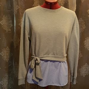 Cute sweater with bow tie and blouse bottom.